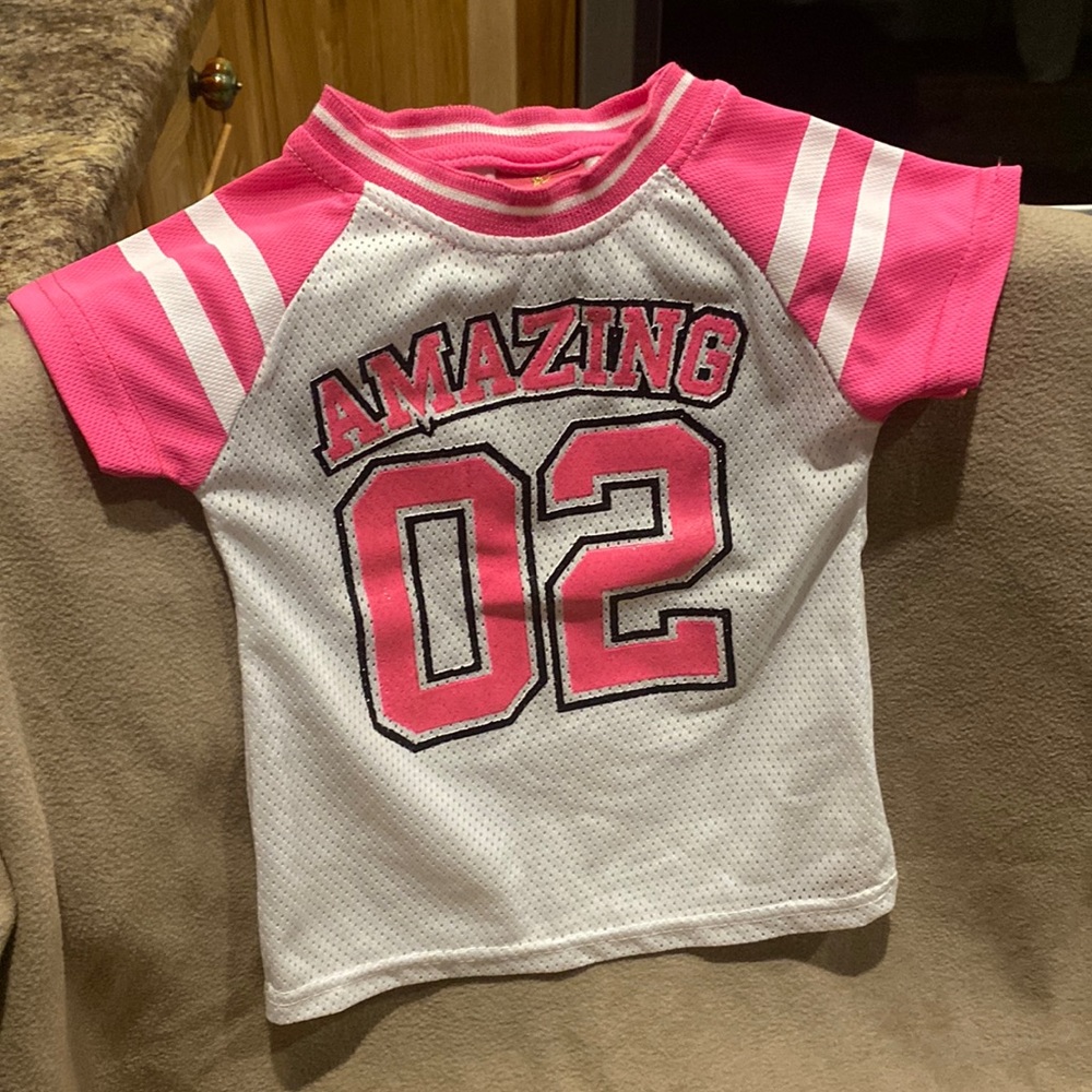 Pink and white “amazing” shirt